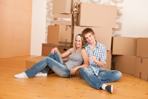 Professional movers organizing and packing items